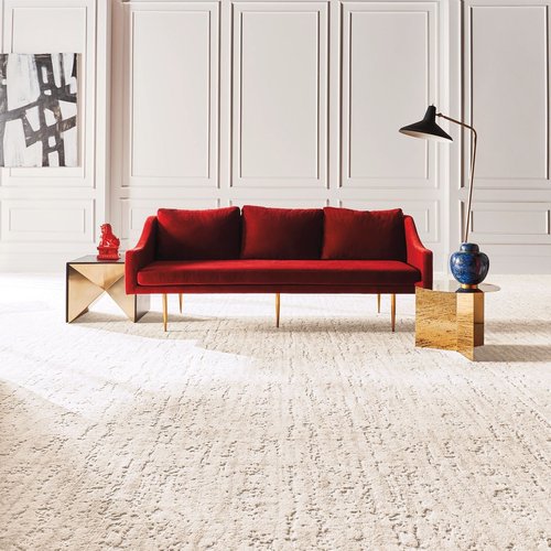 red sofa on white carpet by Green Carpet Co. - The Flooring Connection in San Antonio, TX